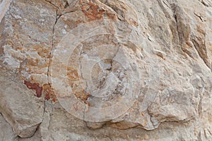 Gray-beige stone texture. Rock. Stone background. Relief surface. Beautiful natural pattern on the plane. Raster image