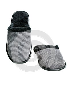 Gray-black men`s slippers isolated on white