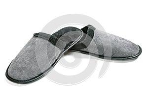 Gray-black men`s slippers isolated on white