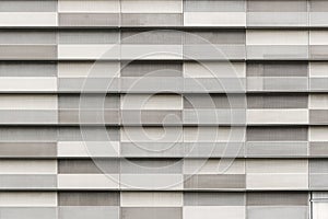 Gray block decorated on modern building. Abstract texture background photo