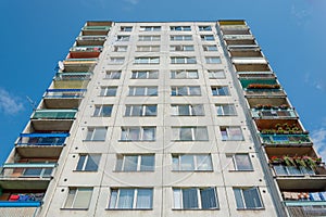 Gray block of flats building show perspective, living in town