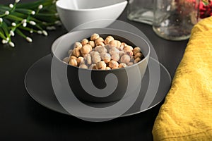 Gray Bowl with  hazelnuts photo
