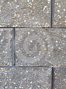 Gray brick stone wall background textured.