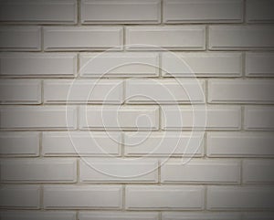 Gray brick wall close-up. Grey background with texture and vignette