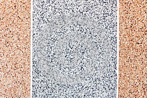 Gray and brown exposed aggregate finish