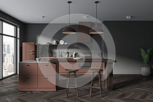 Gray and brown kitchen interior with island