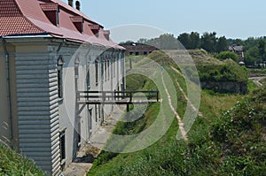 Gray castle with a wooden bridge.