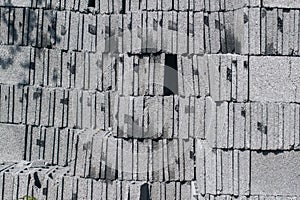 Gray cement cinder block background material for wall panel at site construction