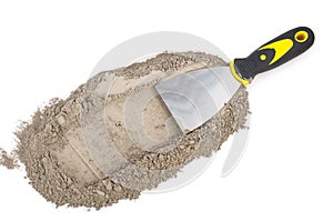 Gray cement powder with trowel