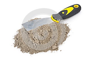 Gray cement powder with trowel