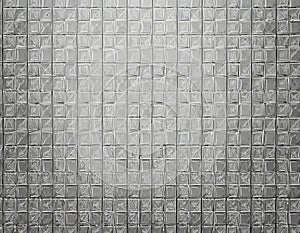 Gray ceramic tile wall texture background, square tile mosaic wall background. AI