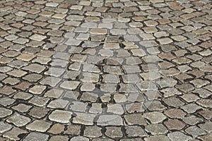 Gray cobblestone with curves, paving stones, Germany