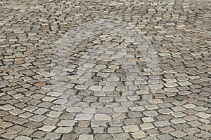 Gray cobblestone with curves, paving stones, Germany