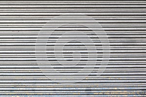 Gray color metal roller shutter door texture and background