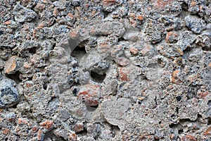 Gray concrete background with stones. Texture or background.