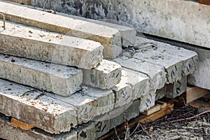 Gray concrete pillars blocks on building materials warehouse .