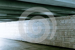 Gray concrete urban background of an underground passage.