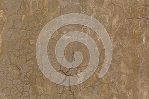 grey dirty cracked plaster wall - flat texture and full frame background