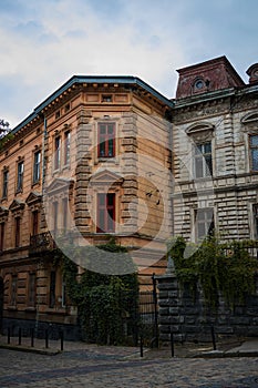 gray empty rainy street of old town exterior buildings landmark urban environment vertical photography