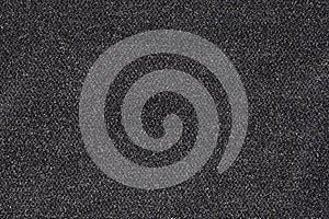 Gray fabric with lurex thread. Woven material with shiny inserts