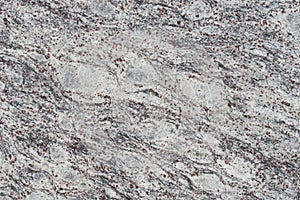 Gray garnite stone wall background texture