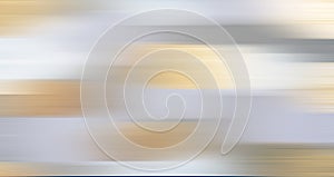 Gray-gold blurred background in motion. Banner or panorama shape