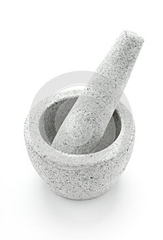 A Gray granite mortar and pestle isolate on a white background