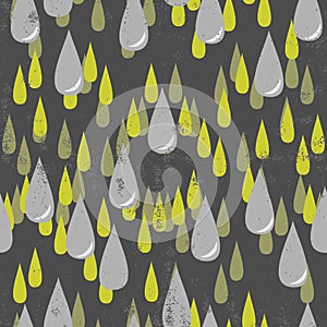 Gray and green rain drops on dark