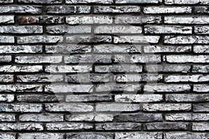 Gray grunge brick wall background. Dark stone texture for design