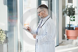 gray hair expertise handsome senior doctor hospital portrait