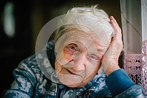 Elderly woman portrait looking at the camera.