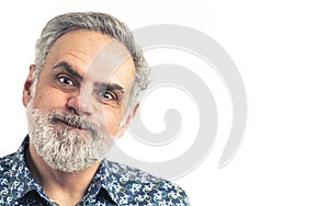 gray haired middle-aged caucasian man doing funny silly face to the camera - isolated