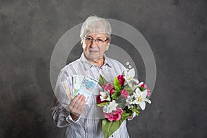 Gray hairy woman with flowers and money