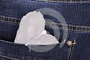 Gray heart shape in jeans pocket