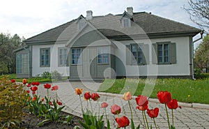 Gray house of Kosachy estate in Kolodiazhne village