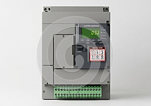 Gray industrial electrical device with a digital display showing 