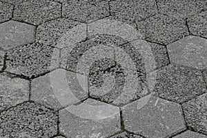 Gray interlocking paving stone driveway directly from above