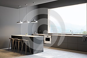 Gray kitchen corner with bar and stools