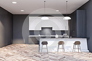 Gray kitchen interior with white bar