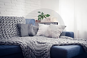 Gray knitted blanket from merino wool