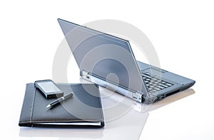 Gray Laptop and Portfolio