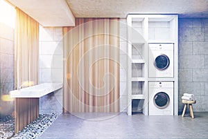 Gray laundry room, washing machine wood, side