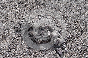 Gray lava stones and ash in volcano