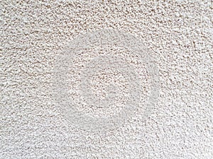 Gray long pile carpet texture background. Polypropylene long pile carpet, close-up, top view