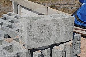 Rectangular thick concrete blocks .