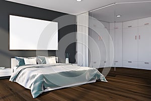 Gray master bedroom corner with horizontal poster
