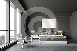 Gray master bedroom interior, armchair and poster