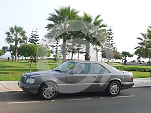 Gray Mercedes-Benz E320 Sportline coupe in Lima