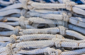 Gray mesh of commercial fish net pattern, close-up