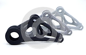 Gray models printed 3D printer from plastic powder isolated on white background